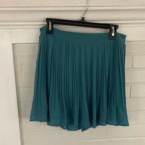 Candie’s pleated skirt